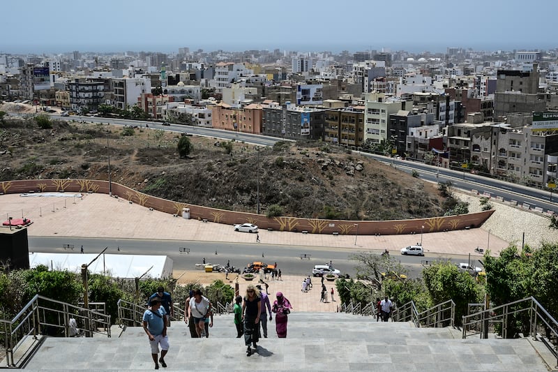 Buildings are seen from Collines des Mamelles at the African Renaissance Monument, outside Dakar, Senegal, in May 2024.