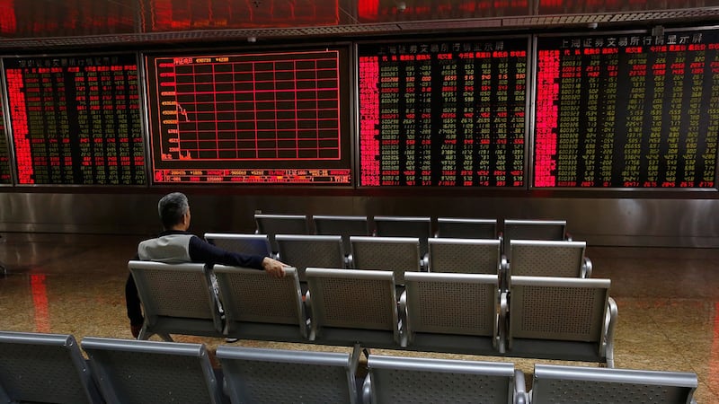 2019年5月14日，北京一家经纪公司的股票价格。上海和深圳两地股市似乎并未受到美中贸易战不利消息影响，沪深股市下跌零点七个百分比。（美联社）